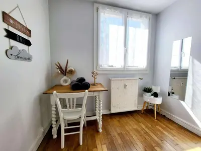 Un ou plusieurs lits dans un hébergement de l'établissement LE LOGIS DE L'ARQUEBUSE GARE, Centre ville et Cité Gastronomique