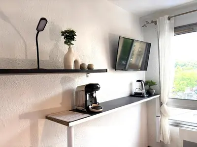 Cuisine ou kitchenette dans l'établissement Studio N210 cozy et fonctionnel