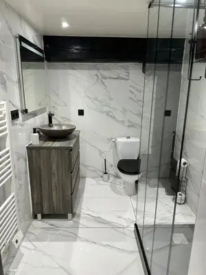 Salle de bains dans l'établissement Les Secrets du Moulin