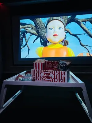 Télévision ou salle de divertissement dans l'établissement Cinema room 3 min de Beaune