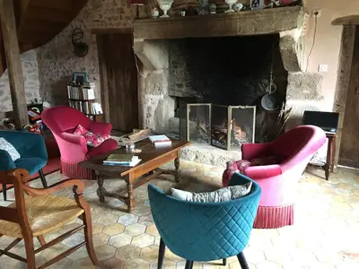 Coin salon dans l'établissement Charmante ferme vue exceptionnelle 10 voyageurs