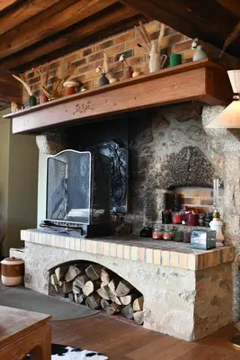 Cuisine ou kitchenette dans l'établissement Le toit du Morvan - Nature & SPA