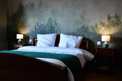 Un ou plusieurs lits dans un hébergement de l'établissement Le toit du Morvan - Nature & SPA