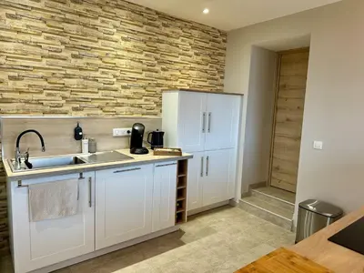 Cuisine ou kitchenette dans l'établissement Au Gray des Flots