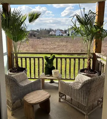 Balcon ou terrasse dans l'établissement Le terrier du Green appartement