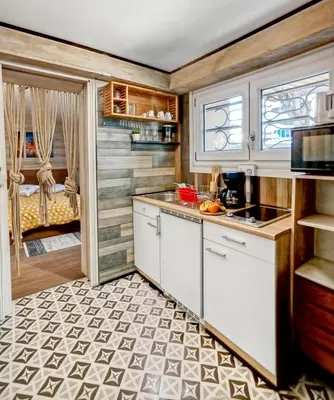 Cuisine ou kitchenette dans l'établissement Le Double Studio AB à Dijon CHU, Ciné & Extérieur