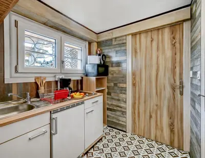 Cuisine ou kitchenette dans l'établissement Le Double Studio AB à Dijon CHU, Ciné & Extérieur