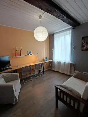 Coin salon dans l'établissement Chambre d'hôte la Chanée
