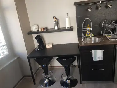 Cuisine ou kitchenette dans l'établissement Charmant studio au cœur de Dijon