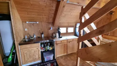 Cuisine ou kitchenette dans l'établissement Le Nid du Lac