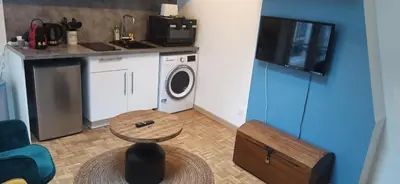 Cuisine ou kitchenette dans l'établissement Studio GIVRY