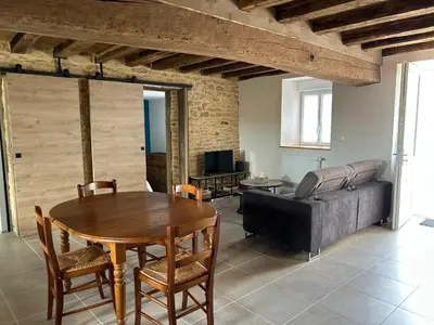 Coin salon dans l'établissement Maison de campagne rénovée