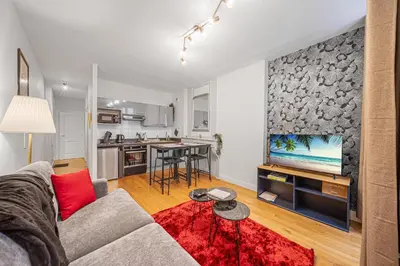 Cuisine ou kitchenette dans l'établissement Le Molière 1 chambre avec patio