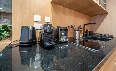 Cuisine ou kitchenette dans l'établissement La voyageuse