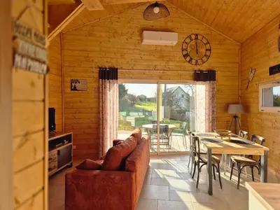 Coin salon dans l'établissement Le chalet du bord de Saône