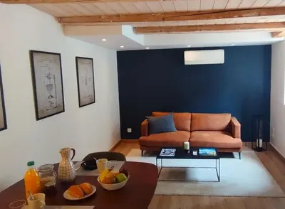 Coin salon dans l'établissement La Suite Des Légendes - Duplex de charme - Centre historique