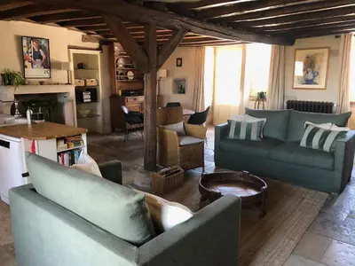 Coin salon dans l'établissement Tivauche