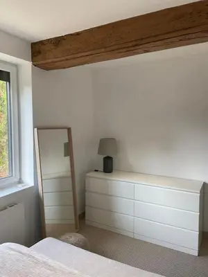 Un ou plusieurs lits dans un hébergement de l'établissement Appartement calme et chaleureux