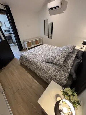 Un ou plusieurs lits dans un hébergement de l'établissement Le Saint Pierre, T2 chic et rénové au coeur du centre ville