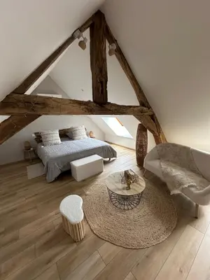 Un ou plusieurs lits dans un hébergement de l'établissement La Fermette de Nuit