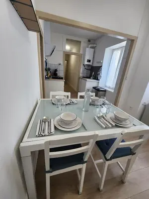 Cuisine ou kitchenette dans l'établissement Le cocon de Charlotte
