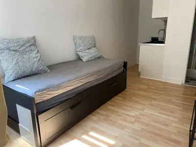 Un ou plusieurs lits dans un hébergement de l'établissement Joli studio centre ville de Dole