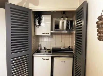 Cuisine ou kitchenette dans l'établissement L'authentique Central - Gare