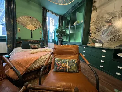 Un ou plusieurs lits dans un hébergement de l'établissement LE JUNGLE-ROOM, Sauna, Hyper-centre