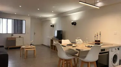 Télévision ou salle de divertissement dans l'établissement L'élégant Central - Cosy