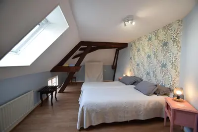 Un ou plusieurs lits dans un hébergement de l'établissement Le jardin caché, maison indépendante classée 3 étoiles