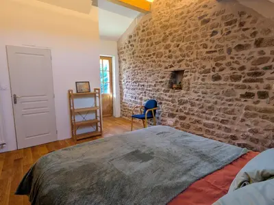 Un ou plusieurs lits dans un hébergement de l'établissement Gîte Les Marions