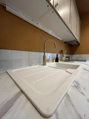 Cuisine ou kitchenette dans l'établissement Le Darcy - Entre Gare et Ville