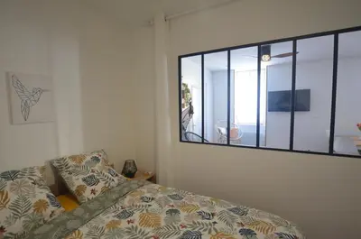 Un ou plusieurs lits dans un hébergement de l'établissement Appartement Indépendant Chagny