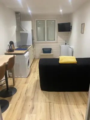 Cuisine ou kitchenette dans l'établissement Le lodge