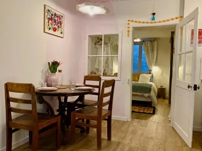 Un ou plusieurs lits dans un hébergement de l'établissement Studio cosy au cœur d'Arbois