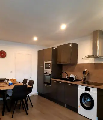 Cuisine ou kitchenette dans l'établissement Logement calme en Morvan