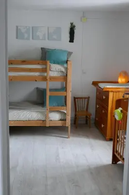Un ou plusieurs lits dans un hébergement de l'établissement Gîte Le Nid Abord