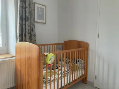 Un ou plusieurs lits dans un hébergement de l'établissement Gîte Le Nid Abord