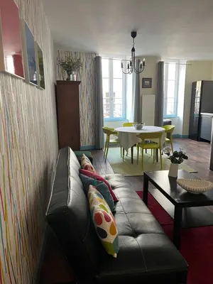 Coin salon dans l'établissement Appartement Buffon
