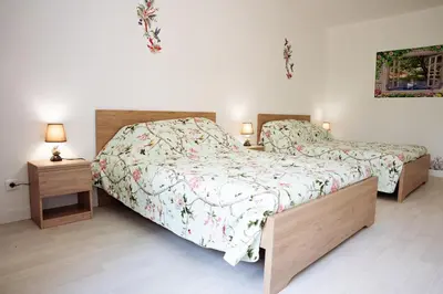 Un ou plusieurs lits dans un hébergement de l'établissement Gîte de la tuilerie