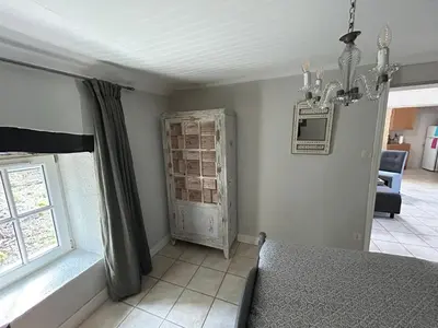 Un ou plusieurs lits dans un hébergement de l'établissement Le Petit Moulin