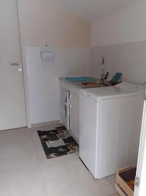Cuisine ou kitchenette dans l'établissement Le Bonnetoit