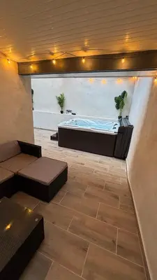 Coin salon dans l'établissement Le Cocon Tournusien