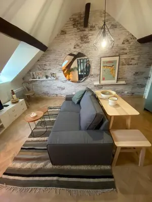 Coin salon dans l'établissement Mini loft de Charme au cœur de la ville