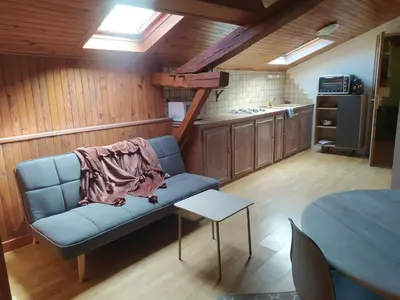 Cuisine ou kitchenette dans l'établissement Le Loft
