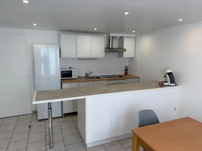 Cuisine ou kitchenette dans l'établissement Résidence des Lilas - Orgelet - Lac de Vouglans