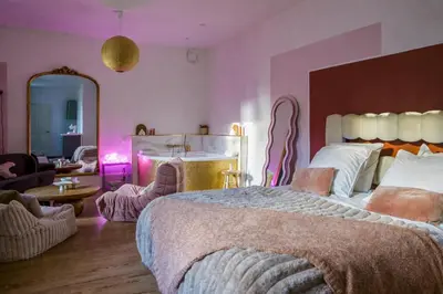 Un ou plusieurs lits dans un hébergement de l'établissement Mini loft Spa - Cosy
