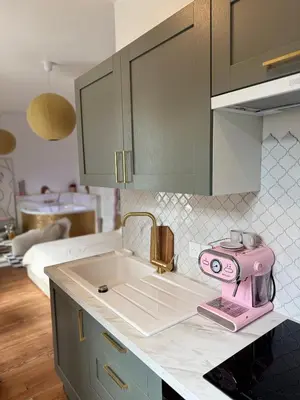 Cuisine ou kitchenette dans l'établissement Mini loft Spa - Cosy