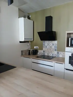 Cuisine ou kitchenette dans l'établissement La Parenthèse Comtoise