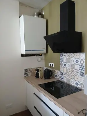 Cuisine ou kitchenette dans l'établissement La Parenthèse Comtoise